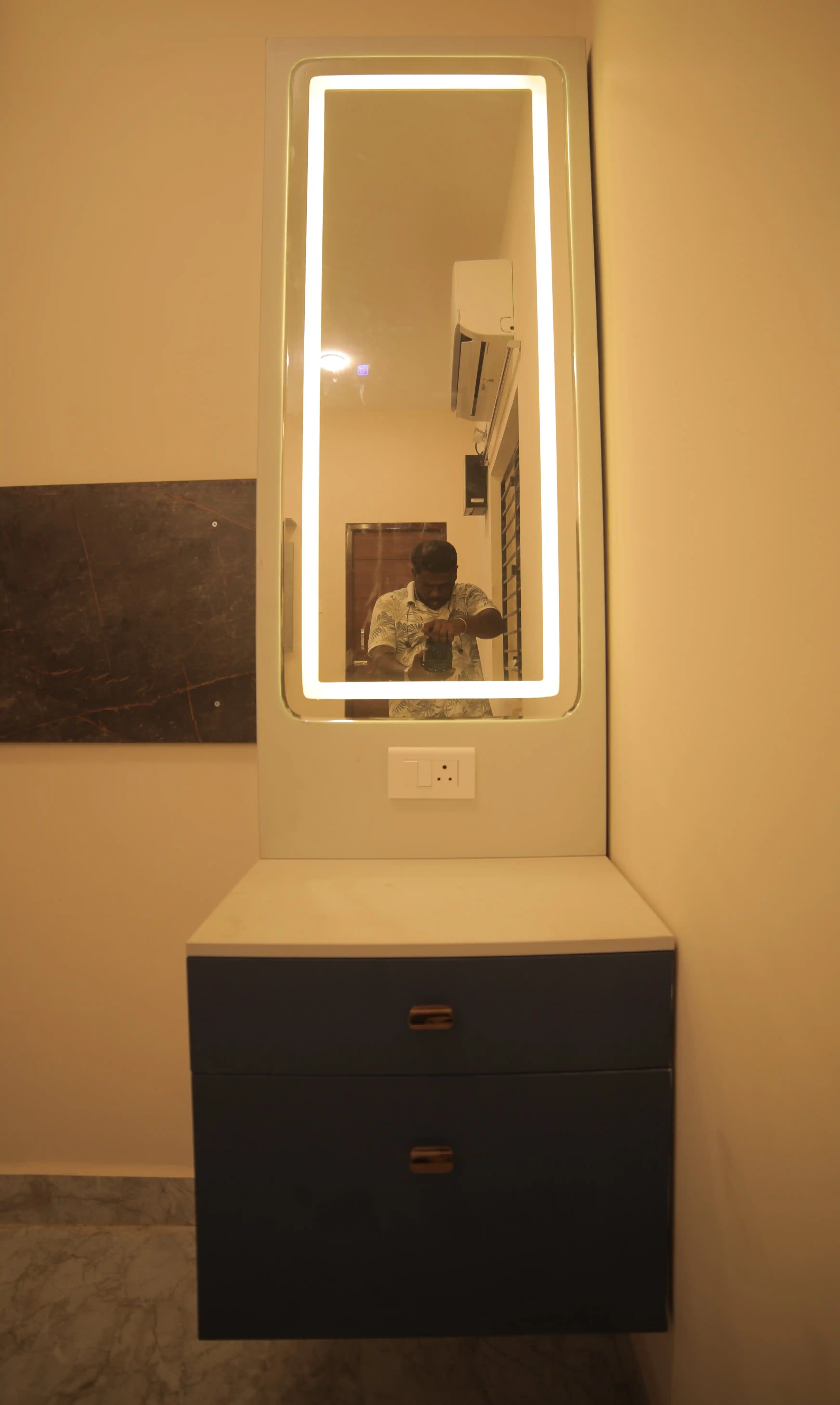Mirror and wall detail in family residence