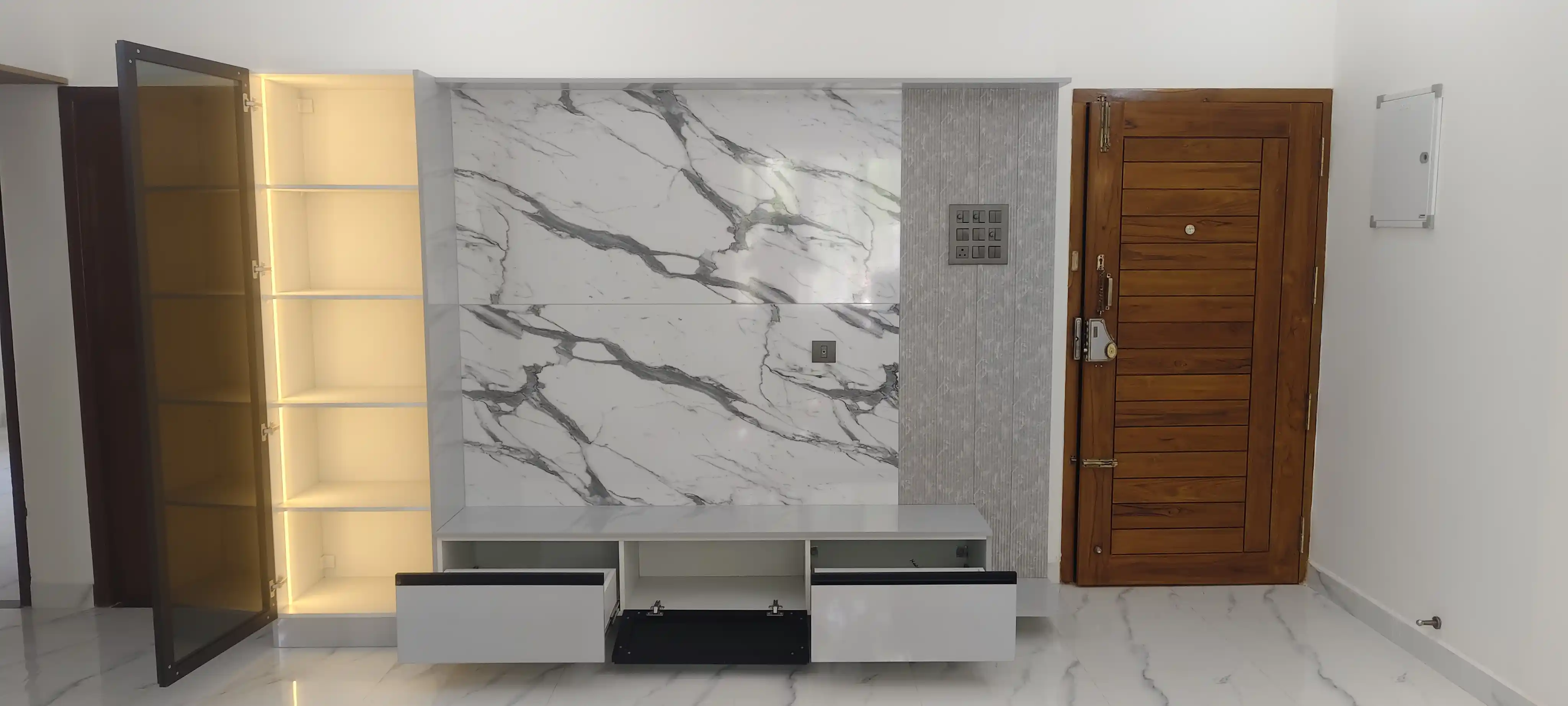 Porur villa entrance with warm material palette